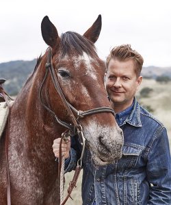 Nathan Turner, Interior Designer & Author, enjoying time with horses at the Alisal Guest Ranch & Resort